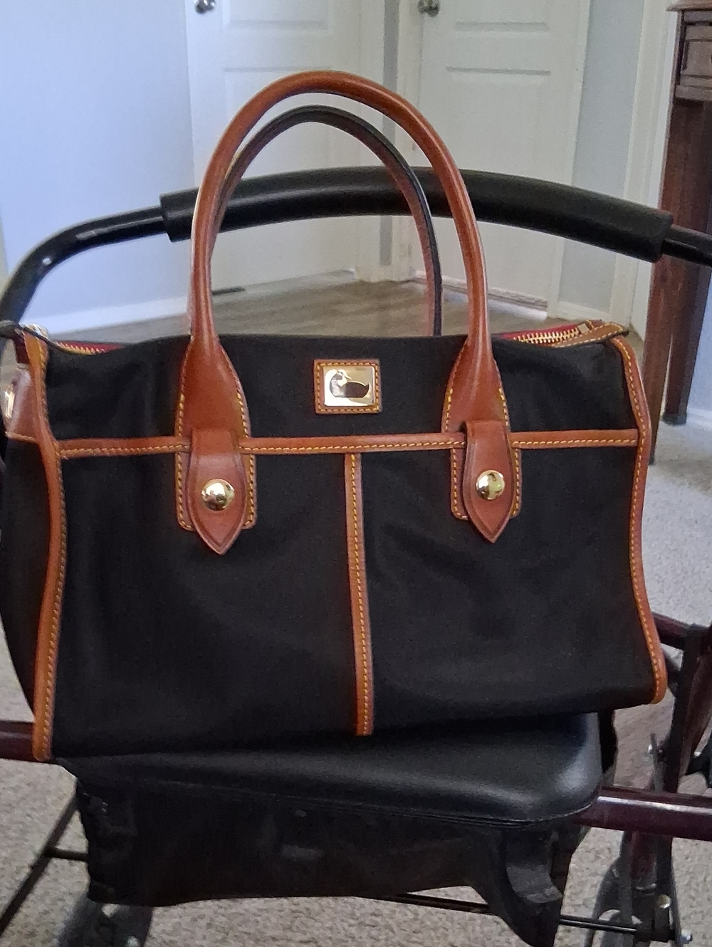 Dooney & Bourke Black Satchel with Brown Leather Trim and Gold Hardware